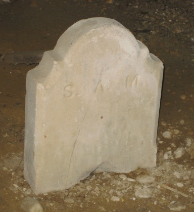 Former Mudd foot stone
